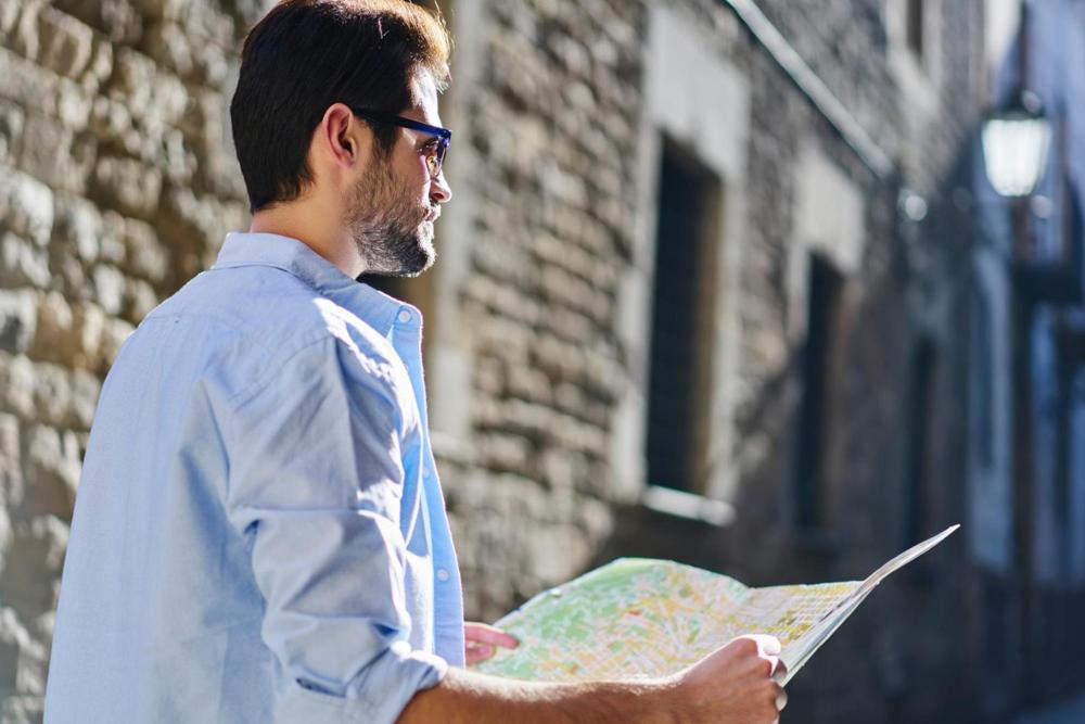 A man following a map.