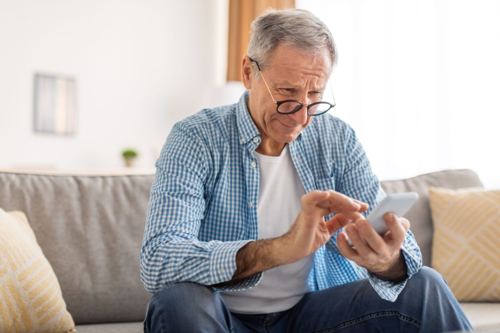 A man using his phone.