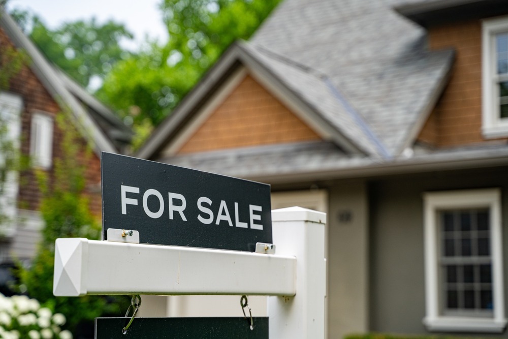 A “for sale” sign outside a property.