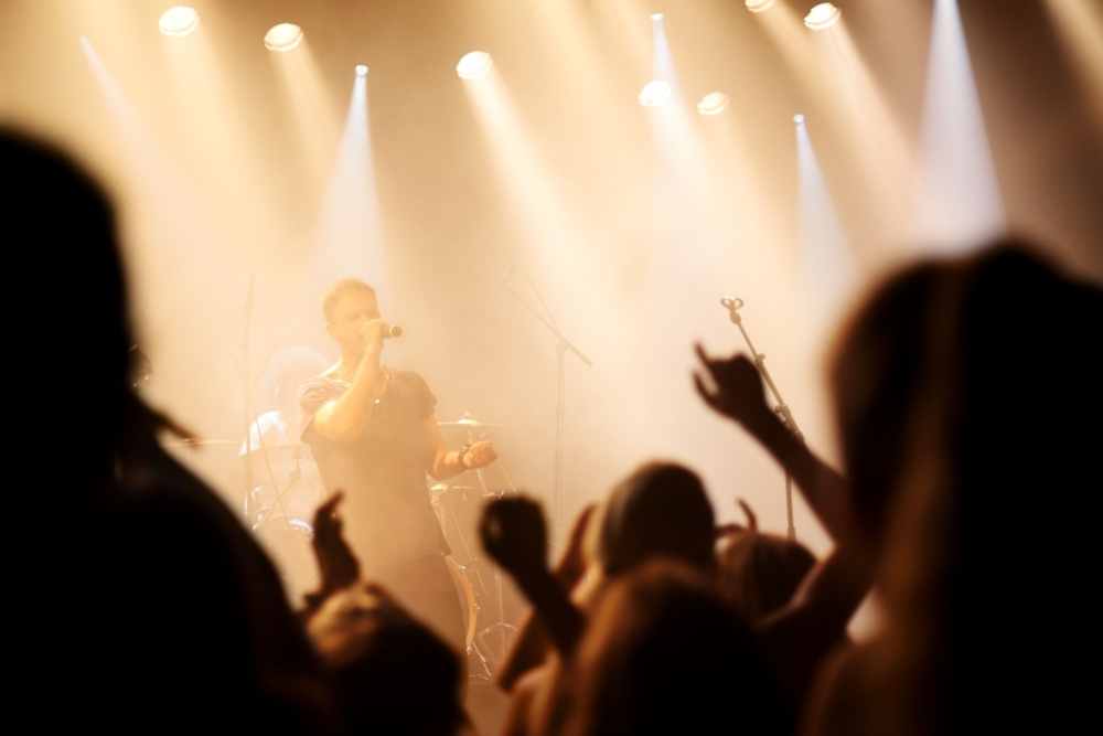 A band on stage at a gig.